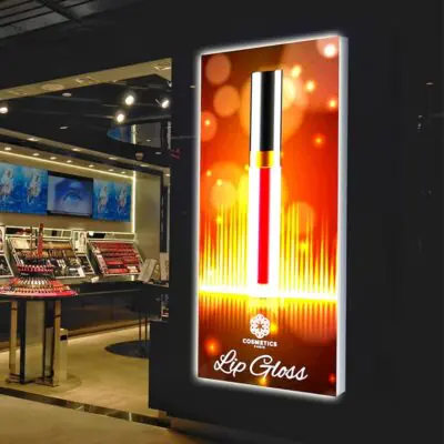 Igniter Wall Mounted Light Box Single-Sided 72" X 36" displaying an illuminated cosmetics advertisement